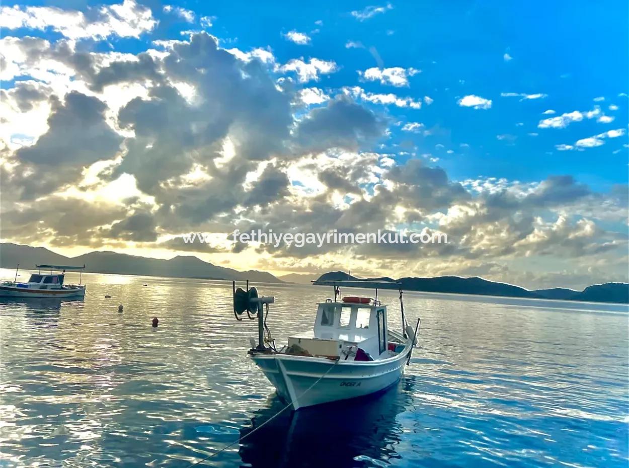 Detached House For Sale On 2000M2 Plot Of Land By The Sea In Marmaris Söğüt Neighborhood. Suitable For Tying A Boat In Front Of It.